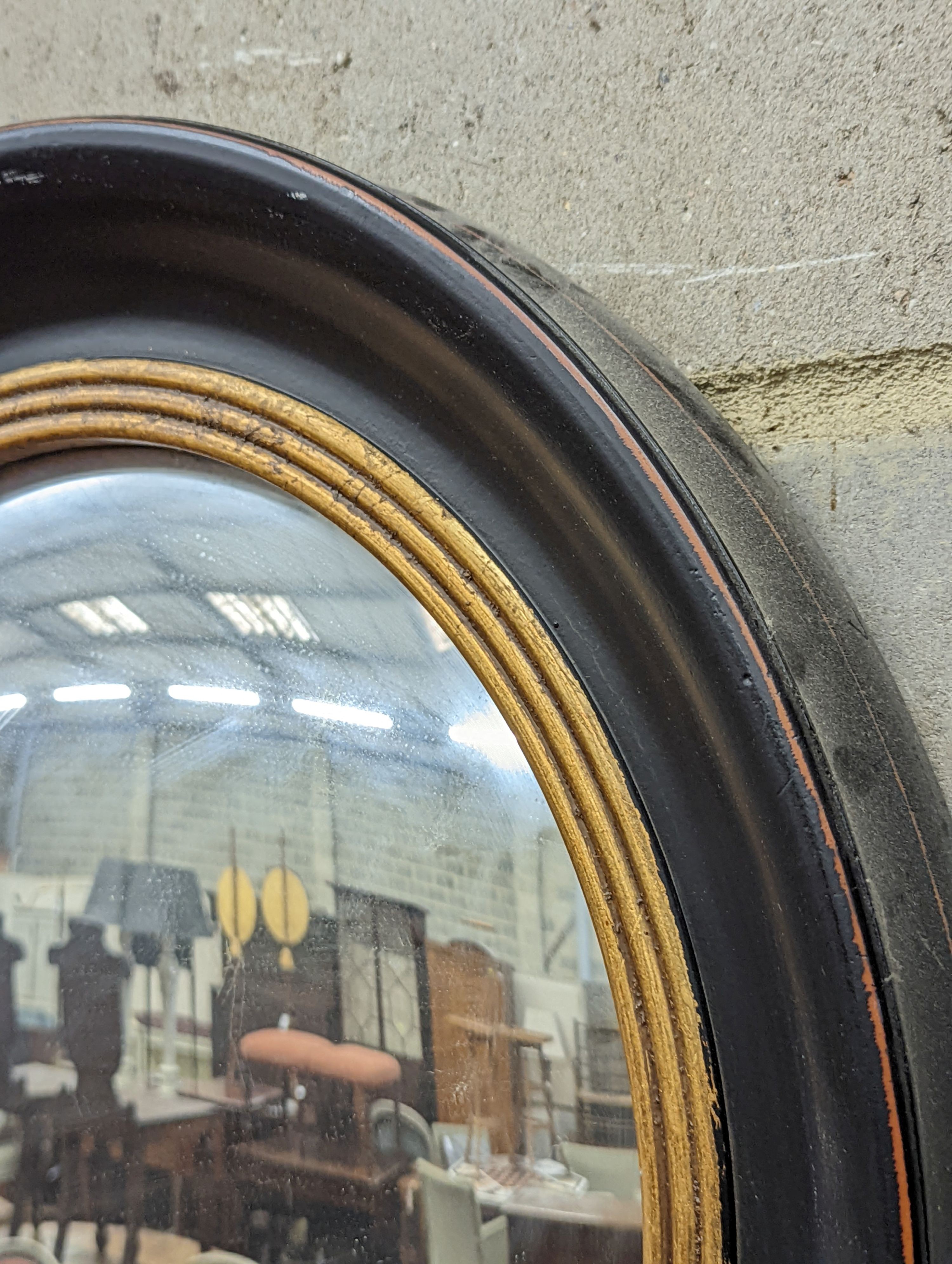 A Regency style circular convex wall mirror, diameter 53cm